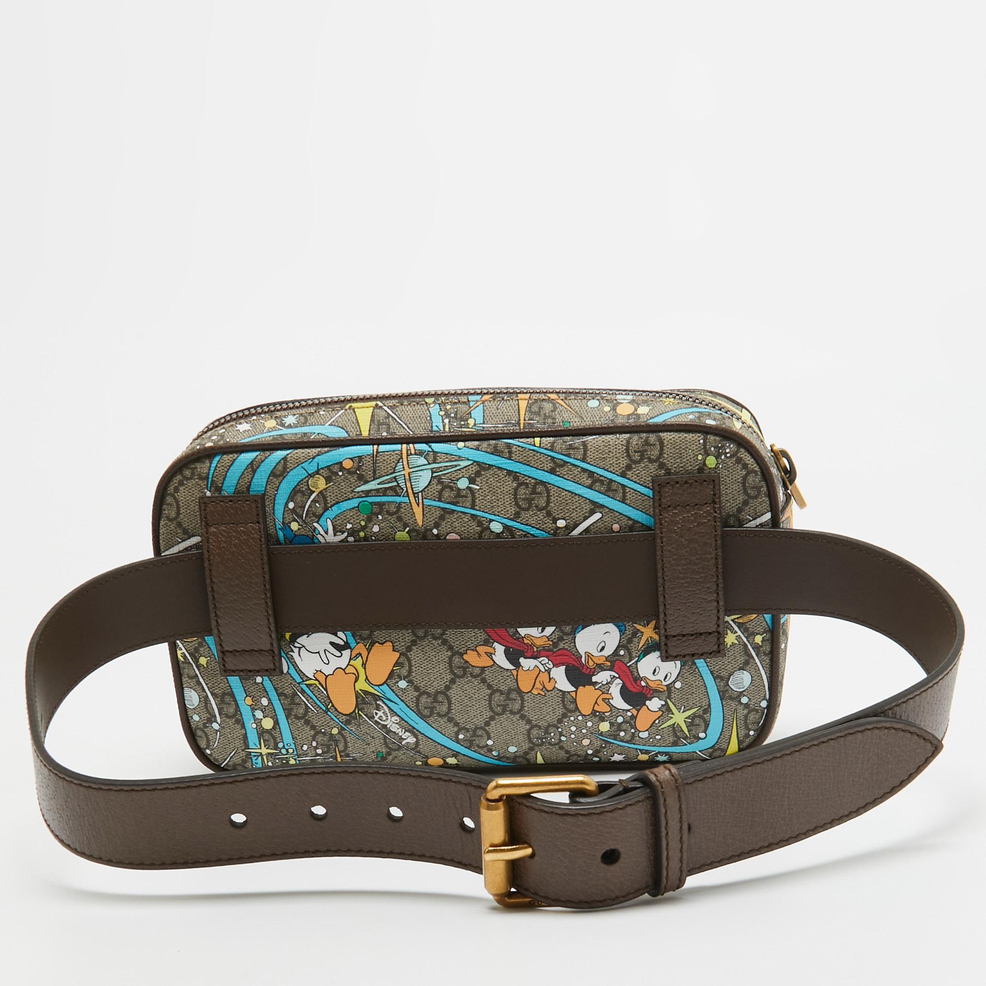 Waist bags are edgy, stylish and will never disappoint you when it comes to completing an outfit! This Gucci x Disney one is crafted wonderfully with a smart exterior, a compact, well-lined interior, and an adjustable belt that sits perfectly on