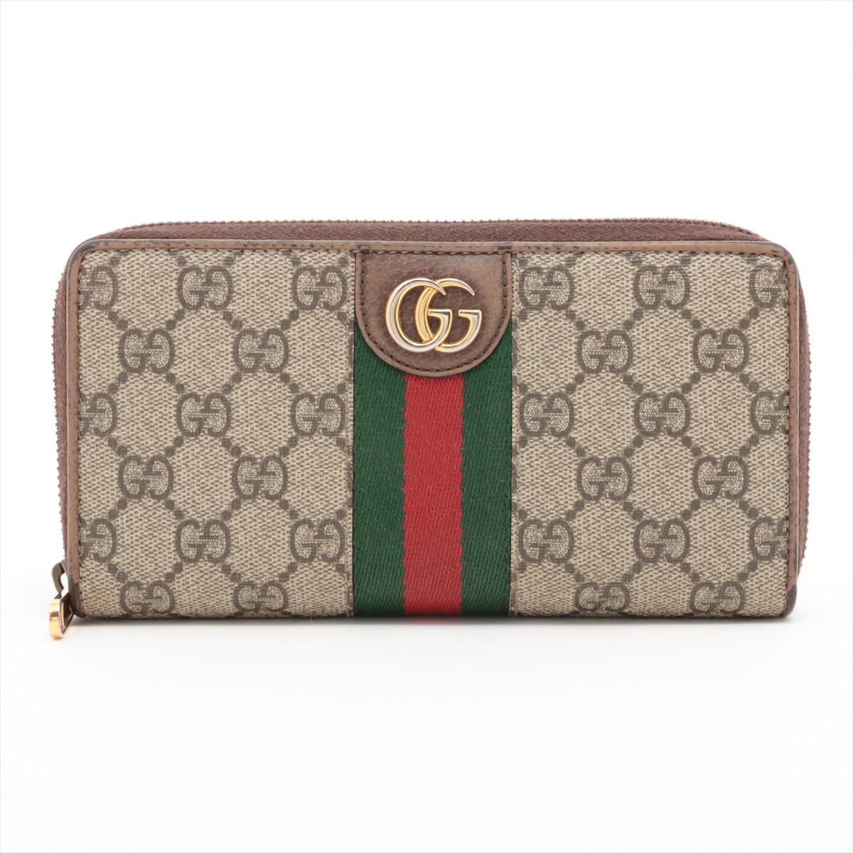 *ships around 11/11

The Gucci x Disney GG Supreme Three Little Pigs Ophidia Leather Zippy Wallet in beige is a playful yet luxurious accessory that beautifully merges iconic fashion with beloved storytelling. Crafted from the signature GG Supreme