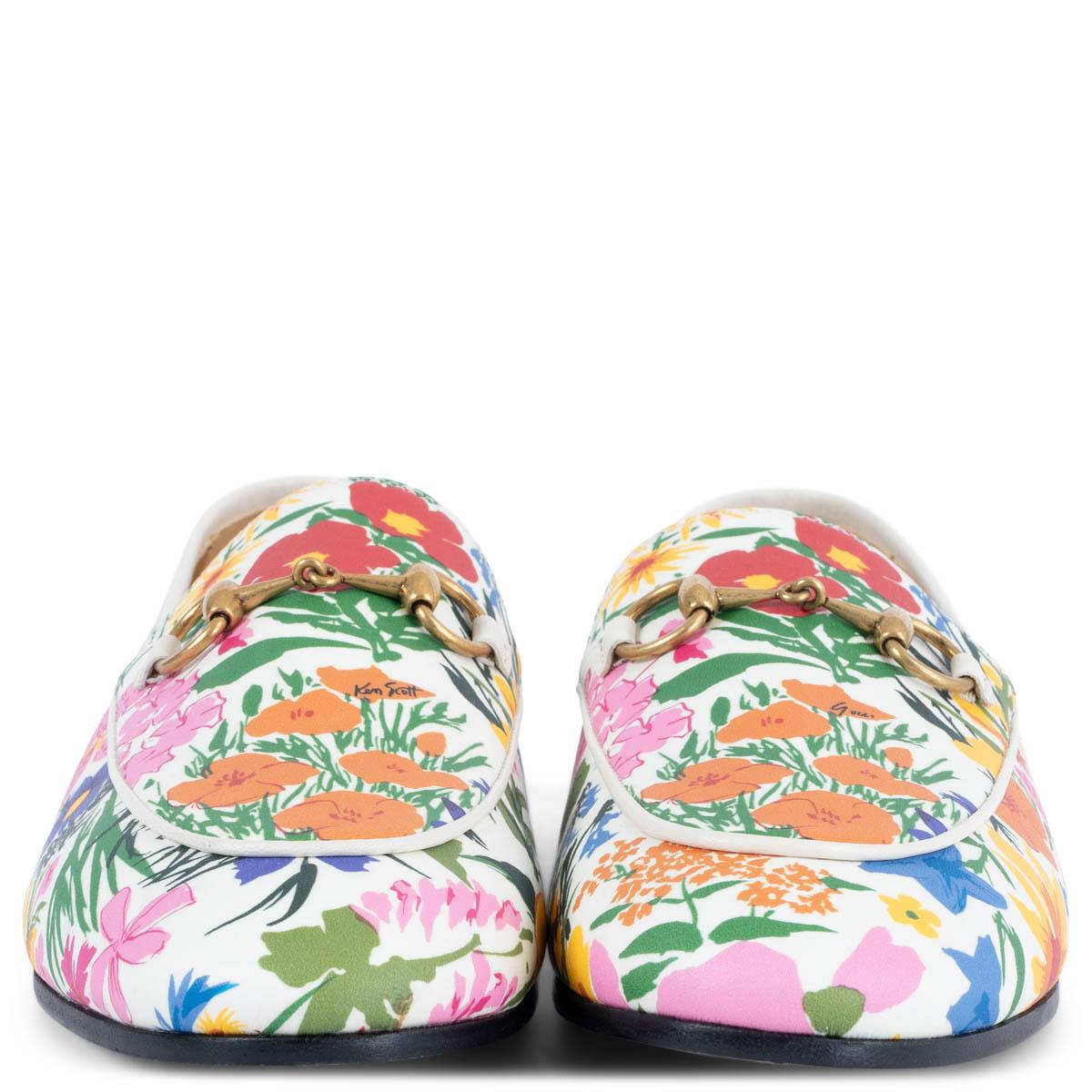 100% authentic Gucci x Ken Scott Jordaan multicolor flower print loafers on white leather with signature antique gold-tone horsebit. Brand new. 

Measurements
Imprinted Size	37
Shoe Size	37
Inside Sole	24.5cm (9.6in)
Width	7.5cm (2.9in)
Heel	1.5cm