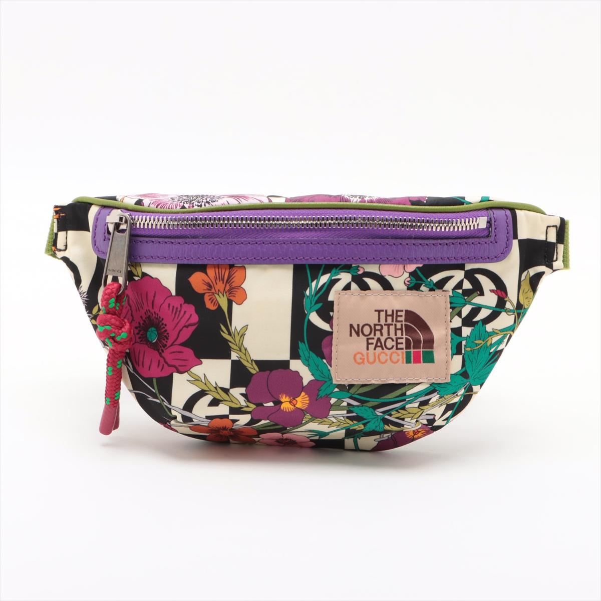 *will ship about 12/9

The Gucci x The North Face Floral Nylon Leather Bumbag in Multicolor is a vibrant and functional collaboration piece that blends high fashion with outdoor-inspired style. Crafted from durable floral-print nylon with leather