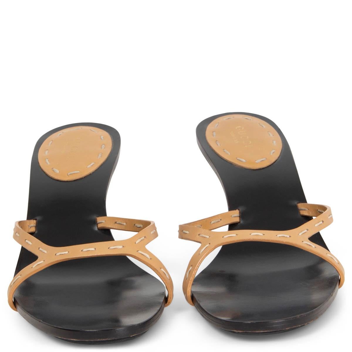 100% authentic Gucci by Tom Ford bamboo heel mules in beige and black leather. Have been worn and are in excellent condition. 

Measurements
Imprinted Size	40C
Shoe Size	40.5
Inside Sole	26.5cm (10.3in)
Width	5.5cm (2.1in)

All our listings include