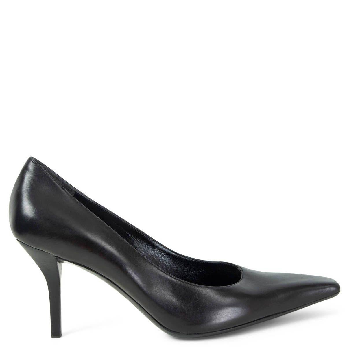 100% authentic Gucci by Tom Ford pointed square-toe pumps in black smooth calfskin embellished with silver-tone metal logo on the right pump. Have been worn once inside and show some scratches on the top of the right heel and on the side of the left