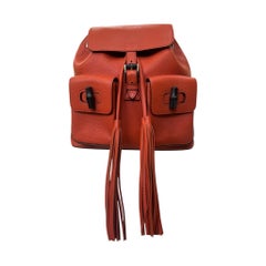 Gucci Y2K Orange Calfskin Backpack with Bamboo Handle and Tassels