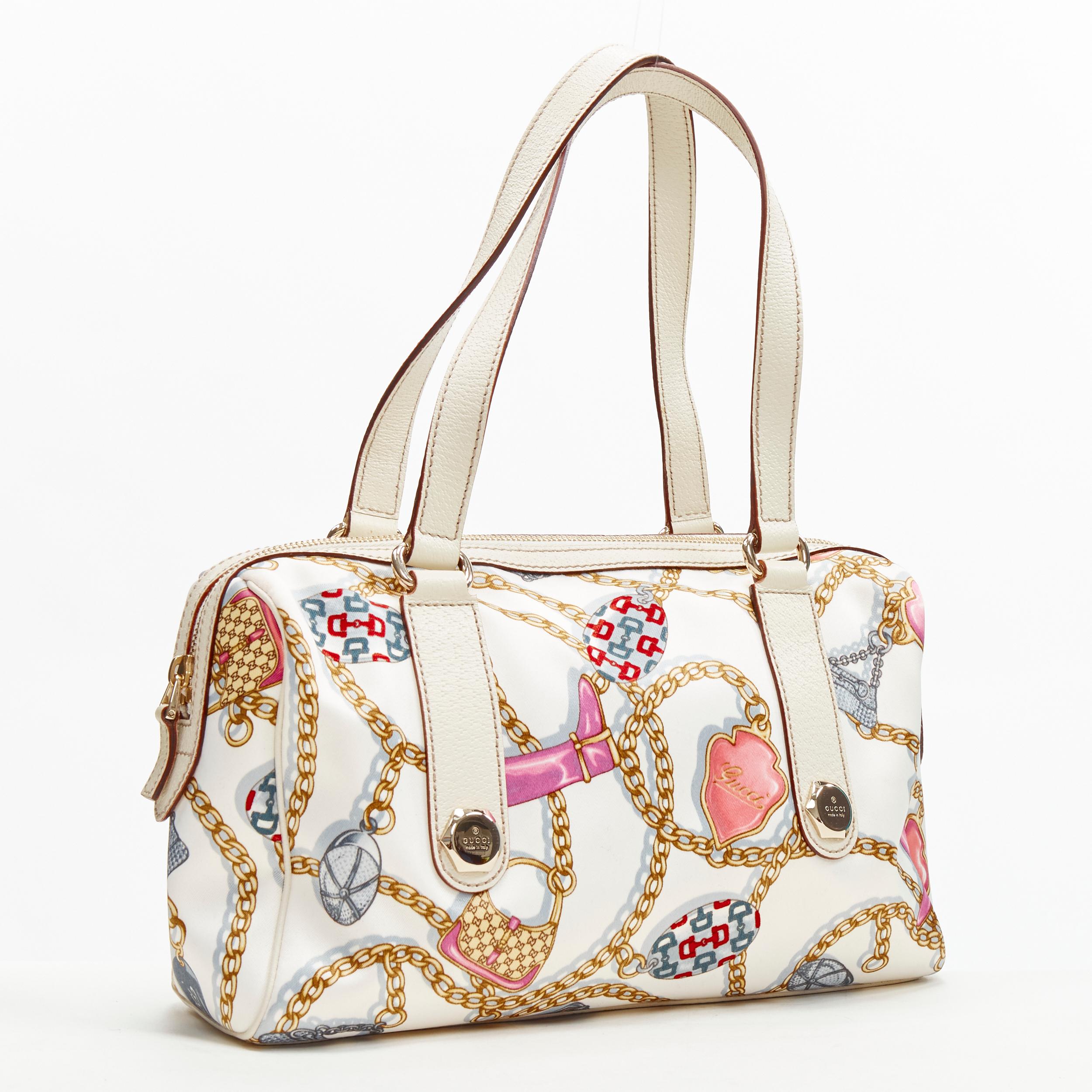 GUCCI Y2K white Charmy chain print ecru leather small Boston bag
Brand: Gucci
Model: 152457 491403
Material: Silk
Color: Ecru
Pattern: Abstract
Closure: Zip
Extra Detail: Charmy gold chain with Gucci DNA print on silk. Ecru white leather trim. Top