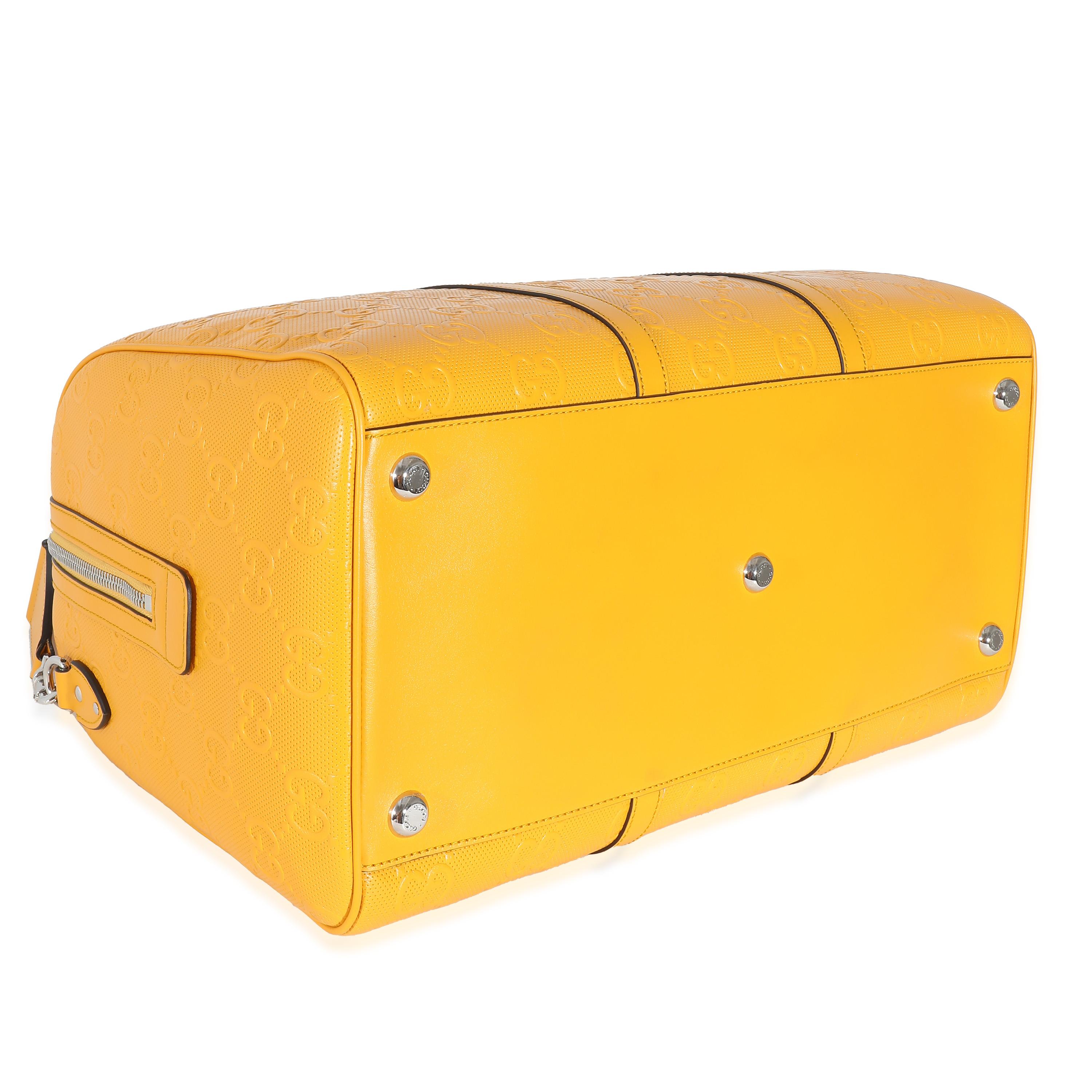 Listing Title: Gucci Yellow Embossed Perforated Calfskin GG Convertible Duffle
SKU: 136386
Condition: Pre-owned 
Condition Description: The Neo Vintage GG Supreme collection from Gucci pays homage to the house’s roots. Designed with a nostalgic