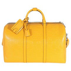 Gucci Yellow Embossed Perforated Calfskin GG Convertible Duffle