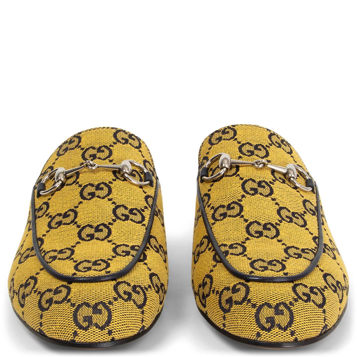 100% authentic Gucci GG Princetown slippers in yellow and black monogram canvas. Brand new. Come with dust bags. 

Measurements
Imprinted Size	38
Shoe Size	38
Inside Sole	25.5cm (9.9in)
Width	7.5cm (2.9in)
Heel	2cm (0.8in)

All our listings include
