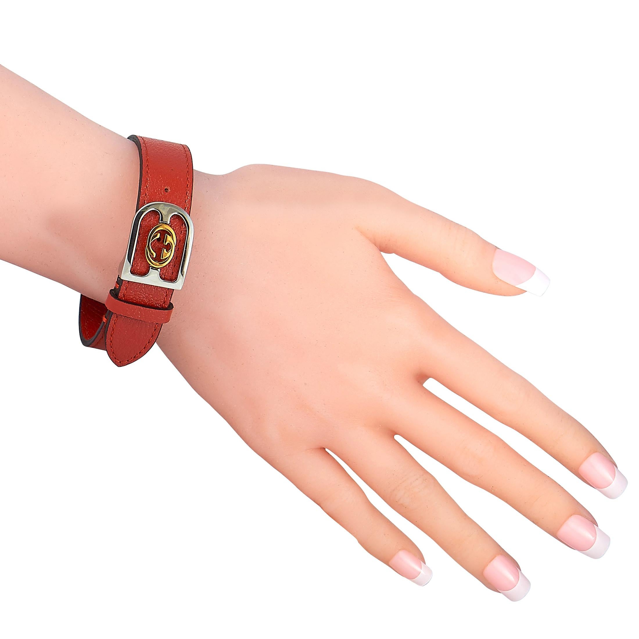 This Gucci bracelet is made of orange azalea leather and fitted with an 18K yellow gold and stainless steel deployment clasp, accentuated with the iconic Interlocking G logo. The bracelet weighs 17.6 grams and measures 8” in length.

Offered in