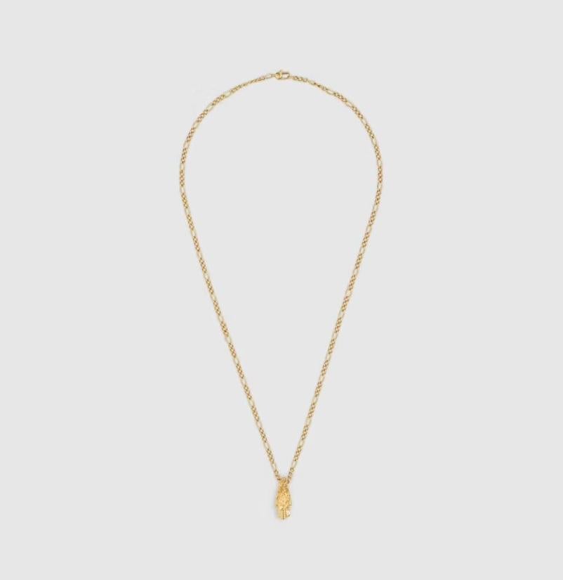 18k yellow gold
Tiger head pendant with white diamond eyes
2 diamonds, totaling approximately .06 carats
Textured chain with clasp closure
Pendant: 26.4mm x 10.6mm
60cm length
Made in Italy
Comes with Gucci box