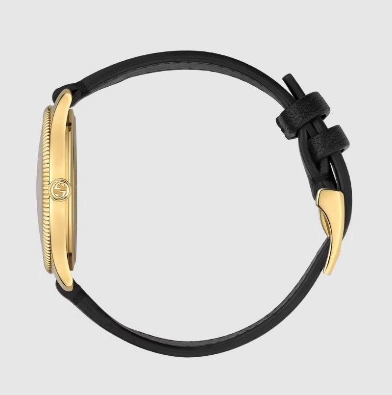 Gucci Yellow gold PVD case, silver sun brushed dial with bee as seconds hand, black leather strap
Sapphire glass with antireflective coating
Quartz movement
5 ATM (160 feet/50 meters)
YA1264181