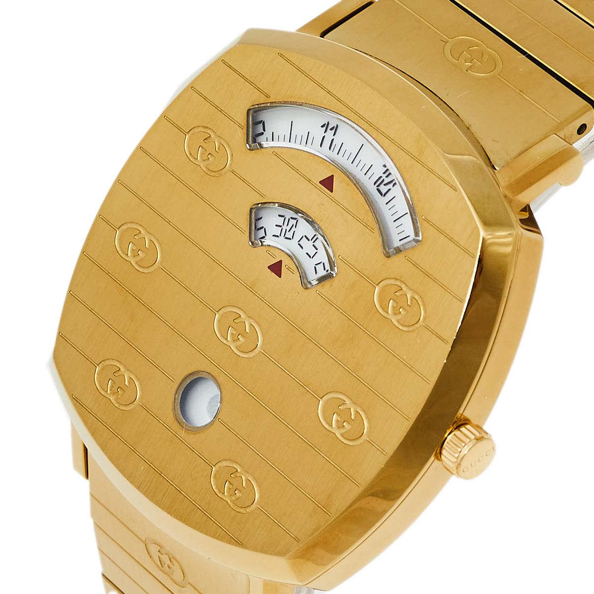 Inspired by the way a rider's shoe sticks to the grip tape of a skateboard, the Grip by Gucci fits comfortably on the wrist. The creation is truly an impeccably finished wristwatch by Gucci to grace your wrist with luxury. Made from yellow gold PVD