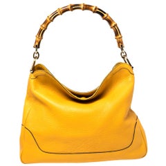Gucci sac à bandoulière Diana en cuir jaune avec poignée en bambou