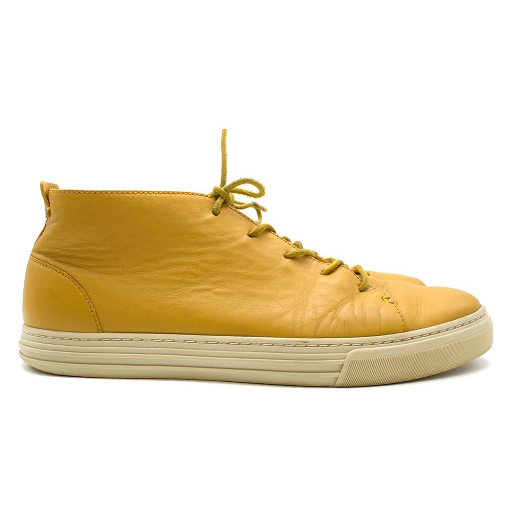 Gucci Yellow Leather Lace Up Shoes

Yellow Leather shoes
Yellow Laces
Thick white rubber sole
Yellow leather interior 
Pull tab with logo 

Please note, these items are pre-owned and may show some signs of storage, even when unworn and unused. This