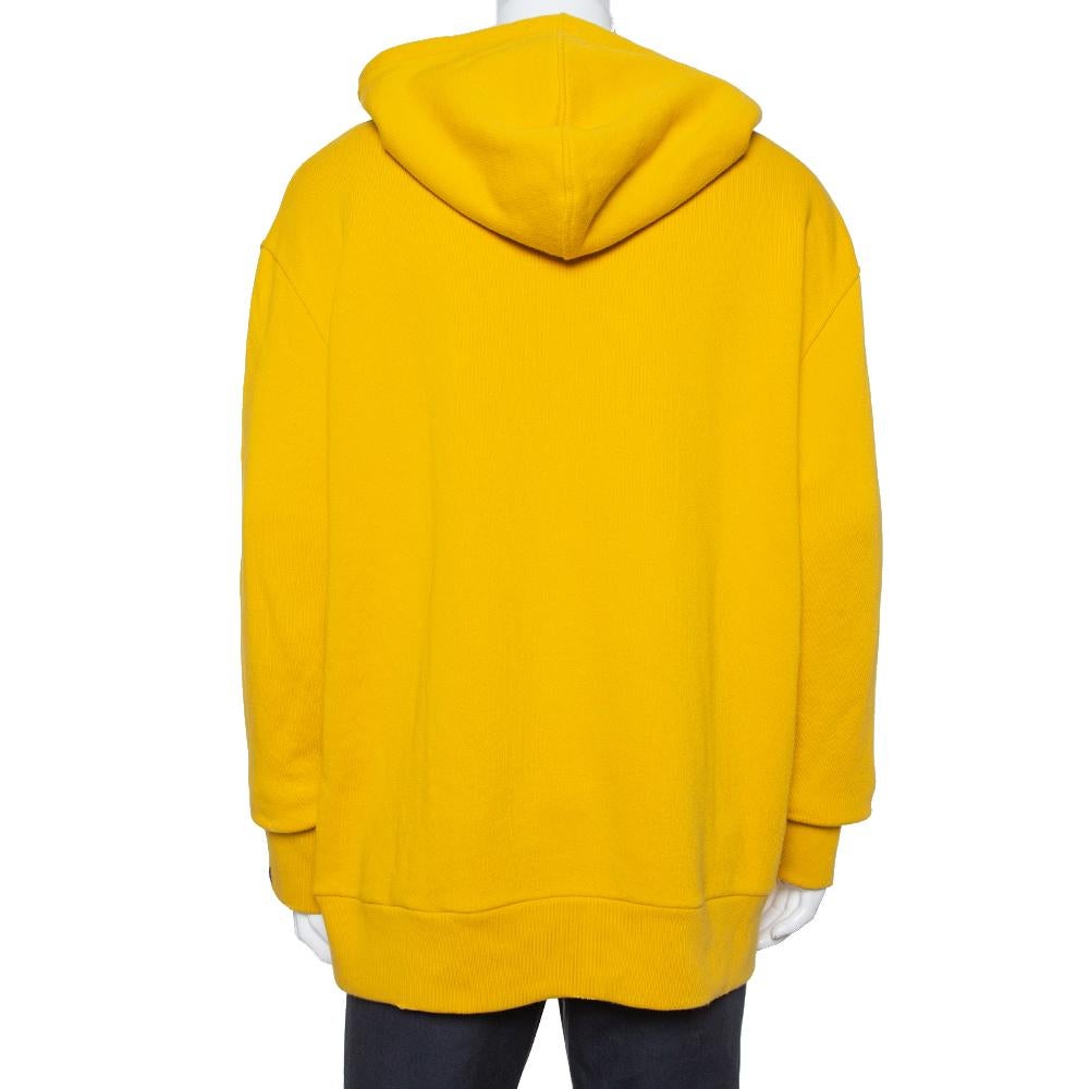 A luxe essential gets a modern update in this cotton hoodie from Gucci. The yellow hoodie features signature detailing, long sleeves, and a drawstring hood. The comfortable creation will offer ample ease and style.

