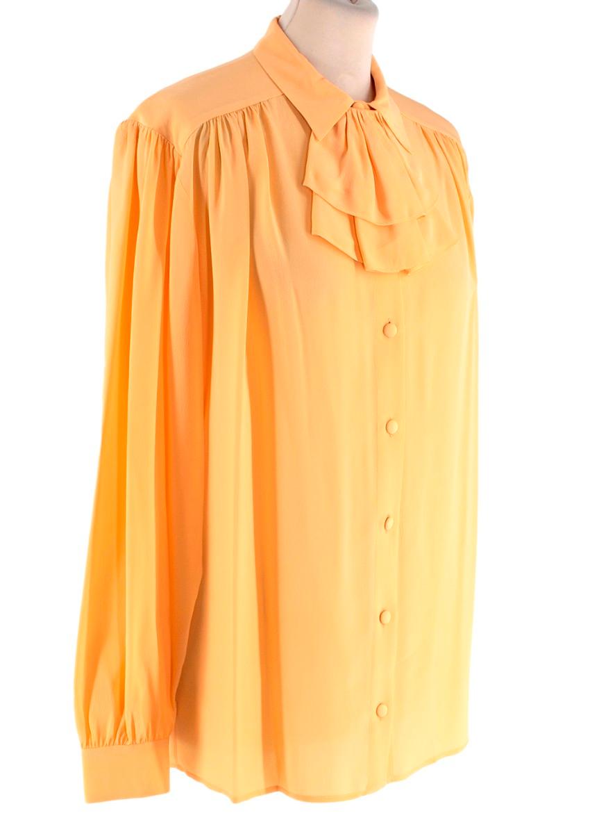 Gucci Yellow Silk-Crepe Detachable Ruffle Blouse 
 

 - Buttercup yellow silk crepe
 - Vintage inspired detachable ruffle detail
 - Point collar, button through with tonal silk covered buttons
 - Long sleeves, classic cuff with tonal silk covered