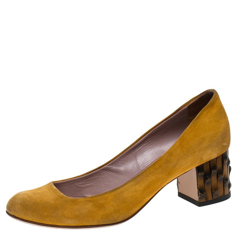 Purposely built to make you feel like a fashion diva, these Gucci pumps are not to be missed. The yellow beauties are crafted from suede and feature round toes with comfy leather-lined insoles. Fabulous bamboo heels complete the pumps making them