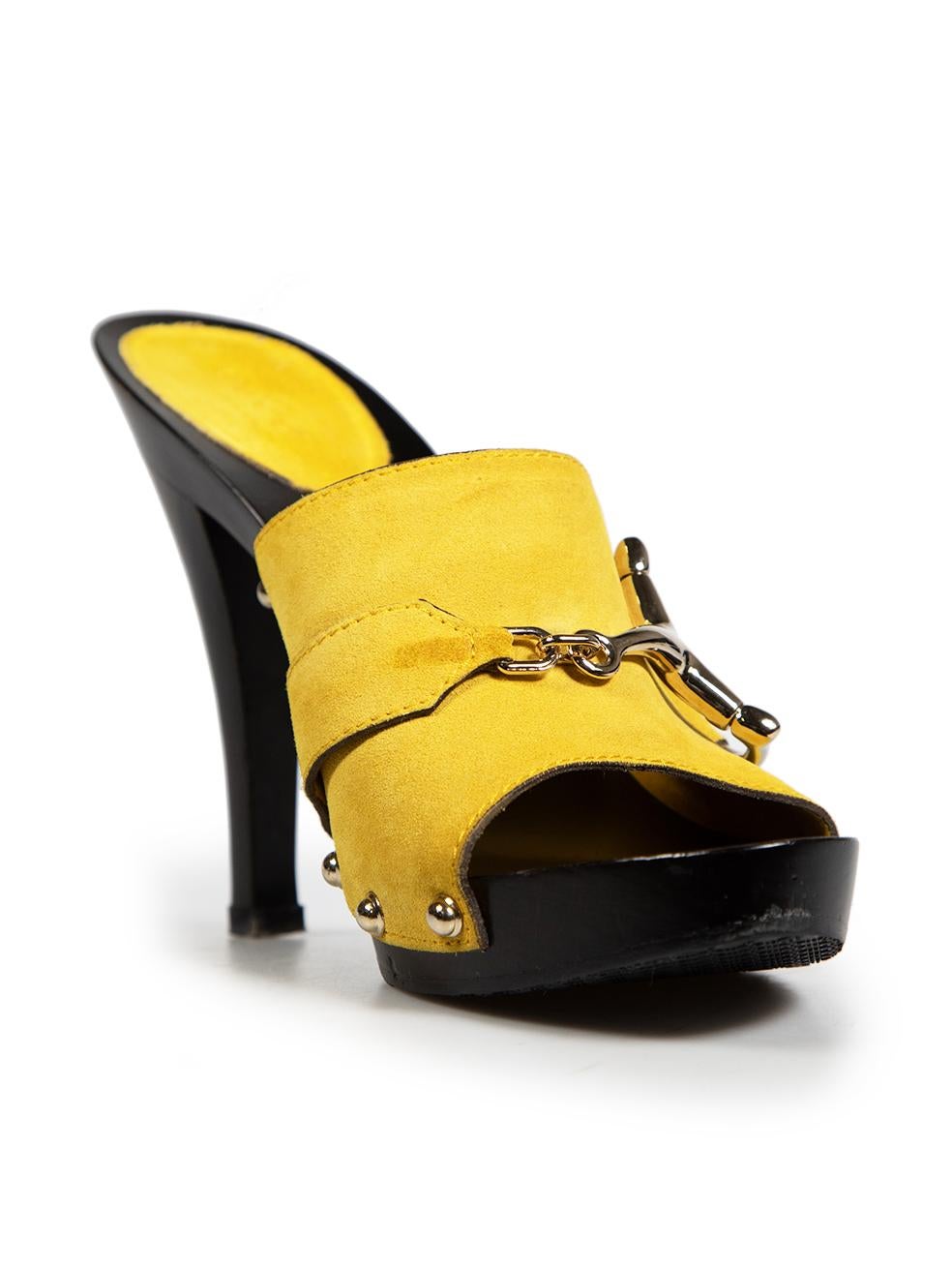 CONDITION is Good. General wear to heels is evident. There is a chip in the wood on heel insole. The suede on the insole has pilling and is slightly discoloured. There are abrasions along the toe ends and on the insoles on this used Gucci designer