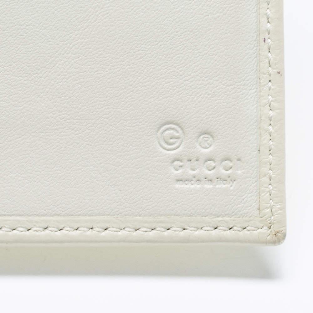 Gucci Gelb/Weiß GG Kontinentale Brieftasche aus Segeltuch und Leder im Angebot 7