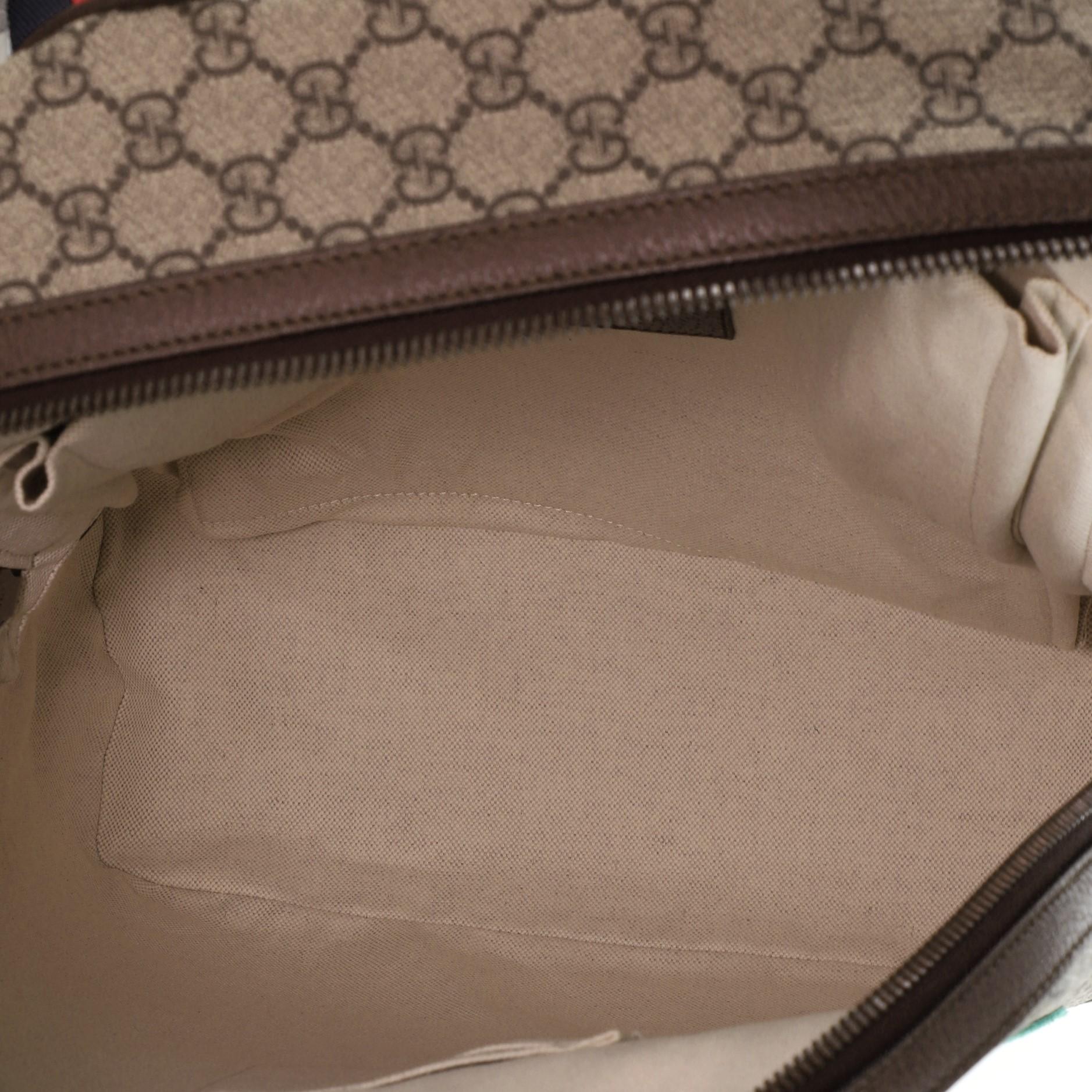 Gucci Rucksack mit Reißverschluss und bedrucktem GG aus beschichtetem Canvas Medium 1