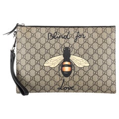 Gucci Zipped Pouch Printed GG Coated Canvas Medium