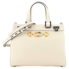 Gucci white gold leather hardware speedy case bag at 1stDibs