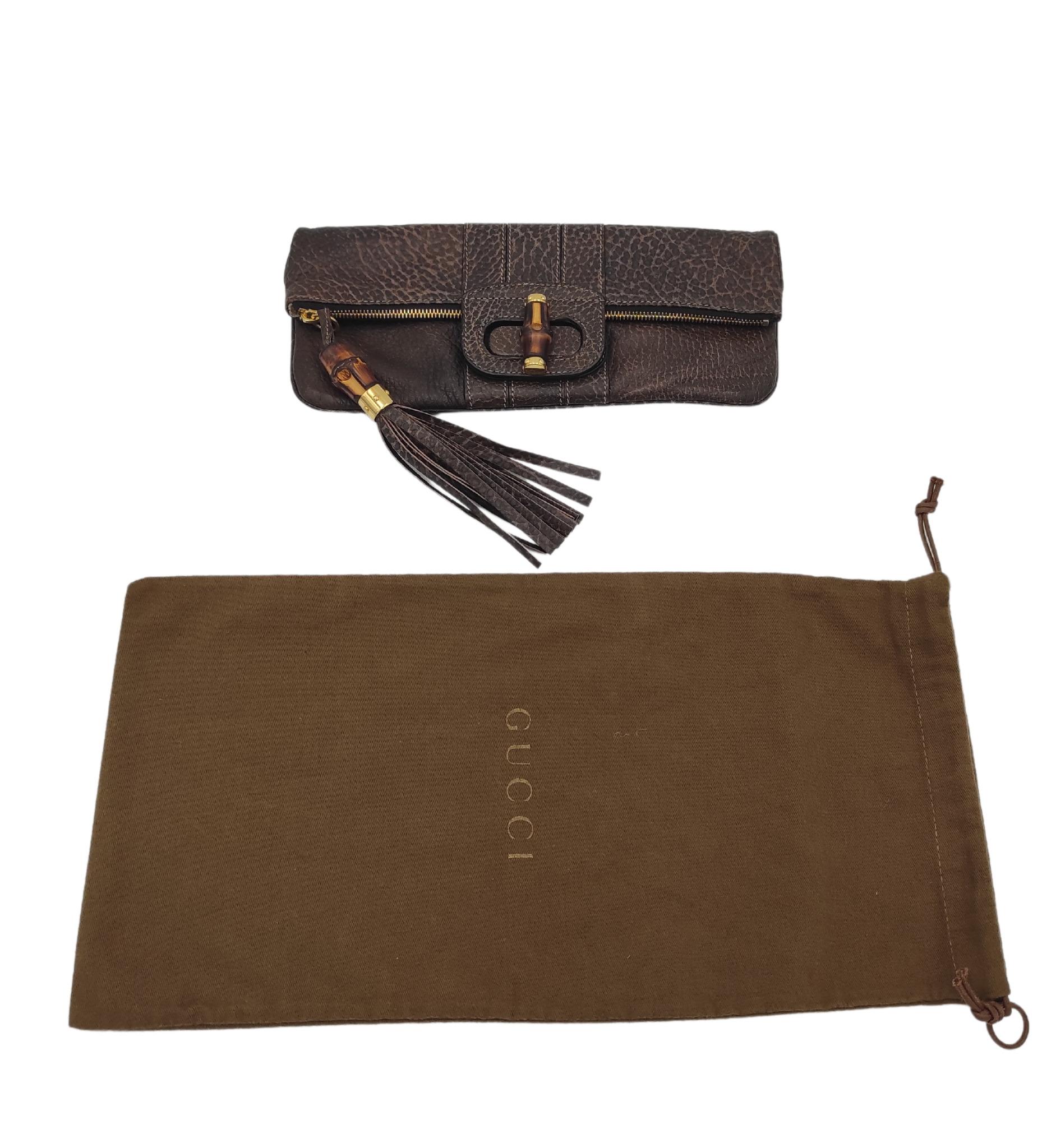 da uomo o donna Gucci Lucy, la pochette in pelle marrone con bambù in vendita
