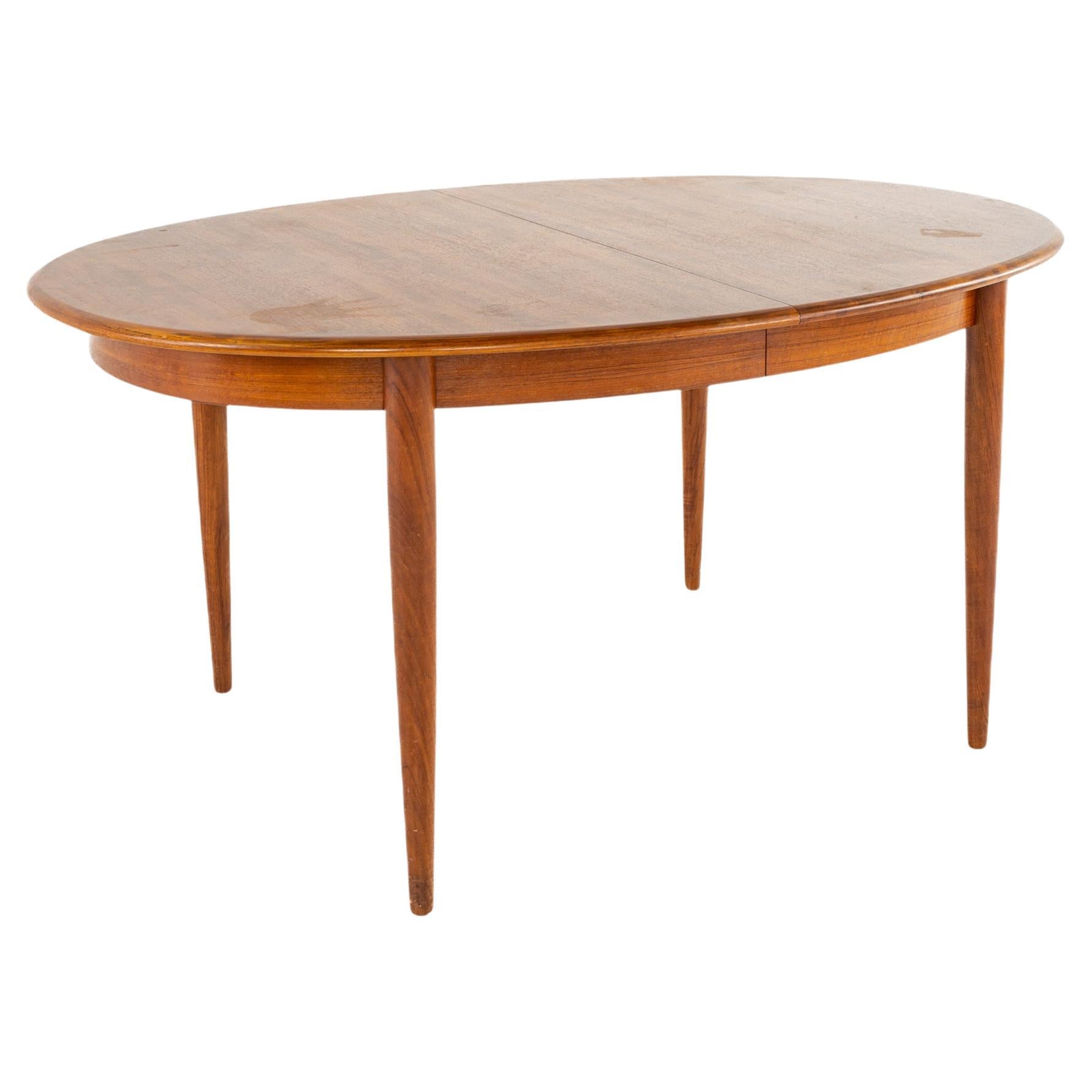 Mid Century Danish Teak Pedestal Base Dining Table with 2 Leaves at 1stDibs