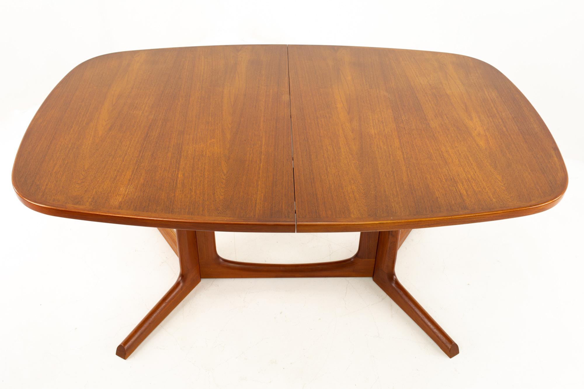 Gudme Mobelfabrik midcentury dining table with 2 leaves

Table without leaves measures: 63 wide x 41.5 deep x 29 high with a chair clearance of 27 inches; width with leaves is 102 inches

This price includes getting this piece in what we call