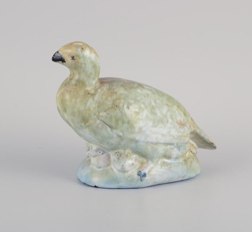 Gudmundur Einarsson (1895-1963). A ceramic figurine in the form of grouse with young.
In excellent condition, insignificant chip on the bottom.
Signed 