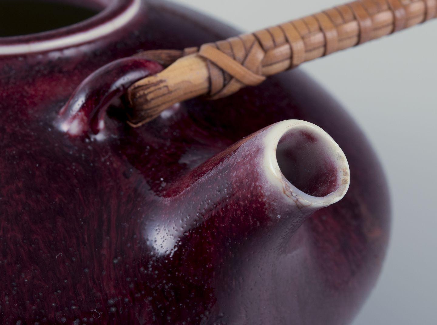 Glazed Gudrun Meedom for Bing and Grondahl. Stoneware teapot with oxblood glaze.