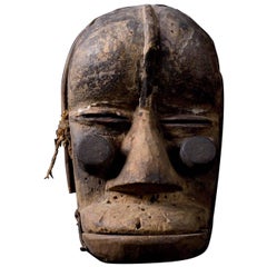 Masque africain en bois de guere avec mâchoire mobile:: début du 20e siècle