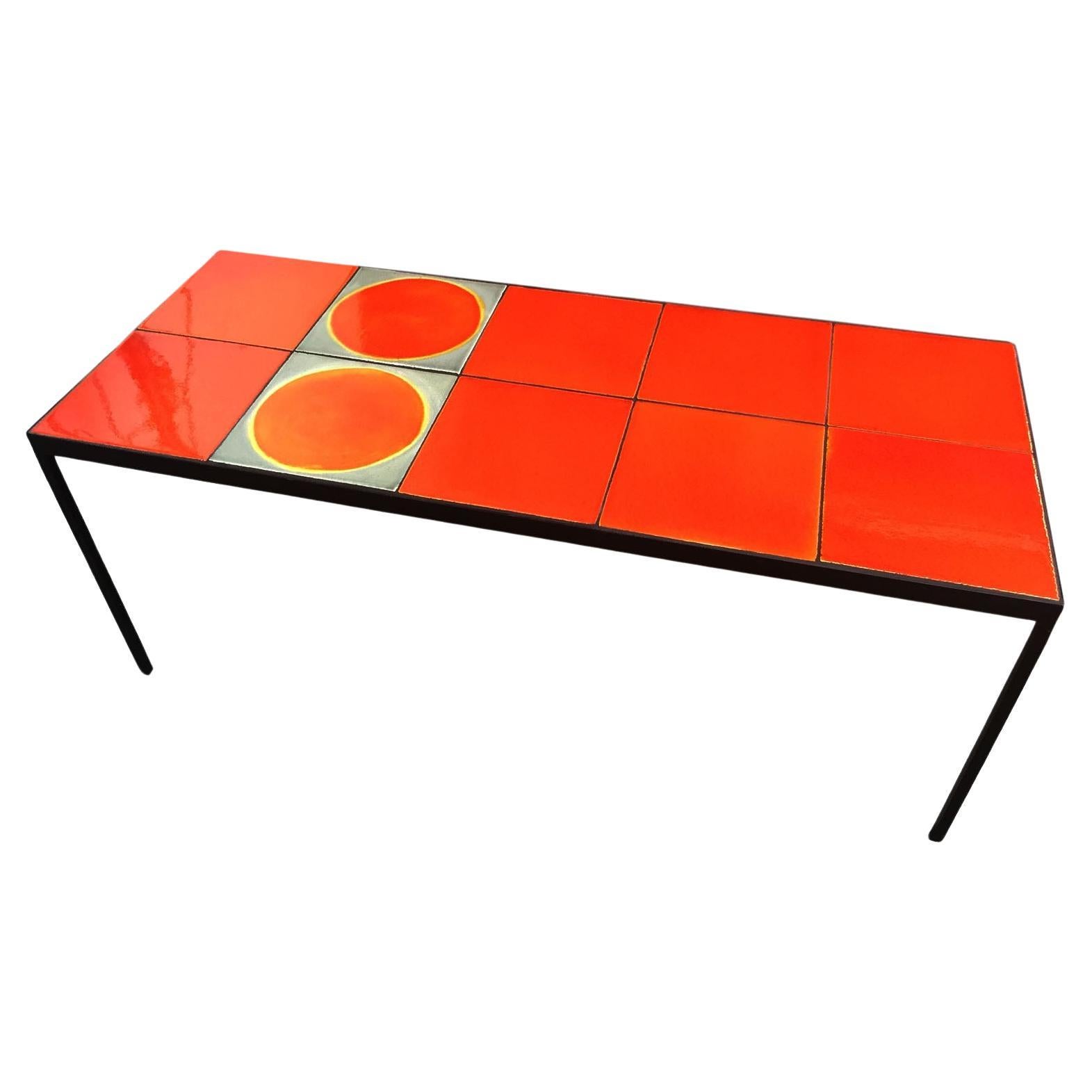 This coffee table is made with 10 ceramic tiles made in the 1970's by Roger Capron, one of the most well-known ceramist of the Modern era.  Each tile is unique, hand-glazed and varied in color and texture. We use these tiles to create tables, coffee