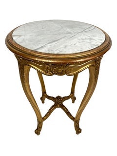 Guéridon en bois doré et plateau de marbre se style Louis XV