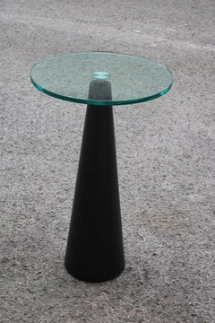 Gueridon Italiano fusto in legno conico laccato nero piano in vetro spesso 1980