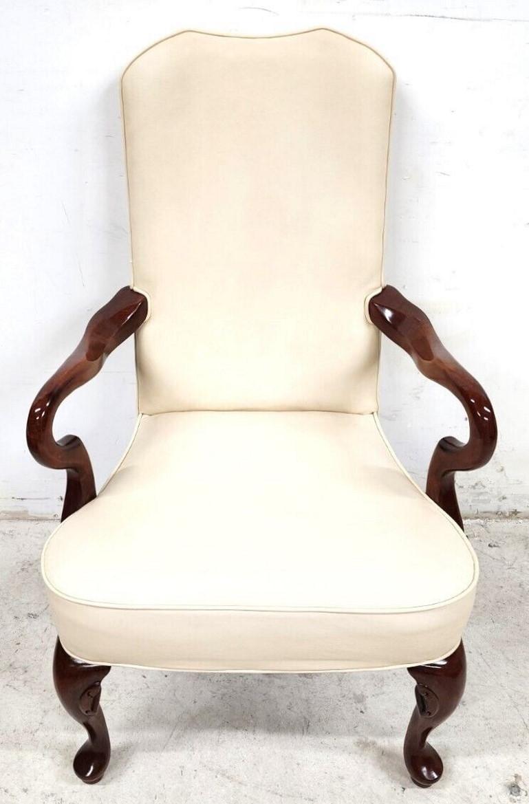 Offering one of our recent palm beach estate fine furniture acquisitions of a 
Guerin solid wood Genuine leather armchair by Leathercraft

Approximate measurements in inches
43