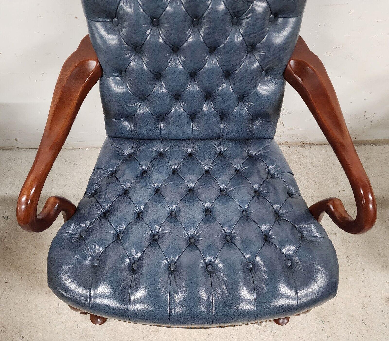 For FULL item description click on CONTINUE READING at the bottom of this page.

Offering one of our recent palm beach estate fine furniture acquisitions of a
guerin leather armchair tufted chesterfield style in slate blue by