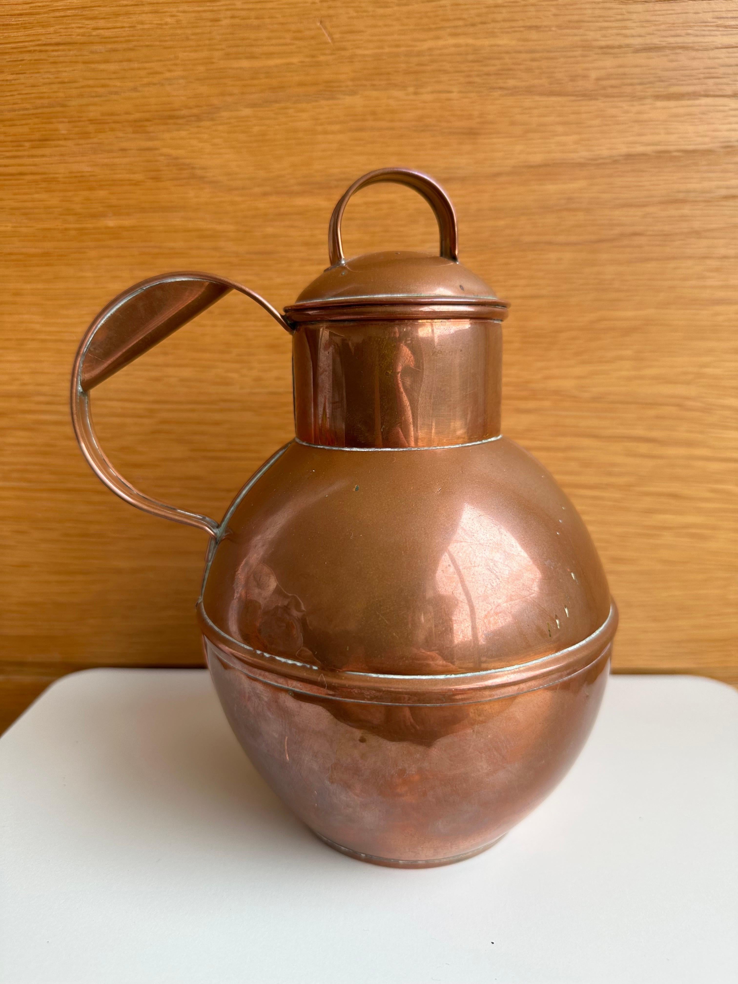 A beautiful Guernsey Copper Lidded Guernsey Milk Creamer Jug, 19th century.

Copper containers of varying shapes and sizes have been used in English homes and kitchens for many centuries. Copper and its alloys were particularly popular metals for