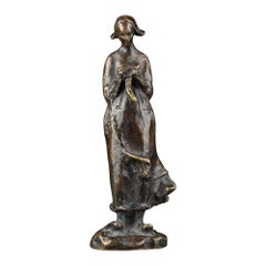 Guero : Sculpture en bronze patiné représentant une jeune femme bretonne - Début du 20ème siècle