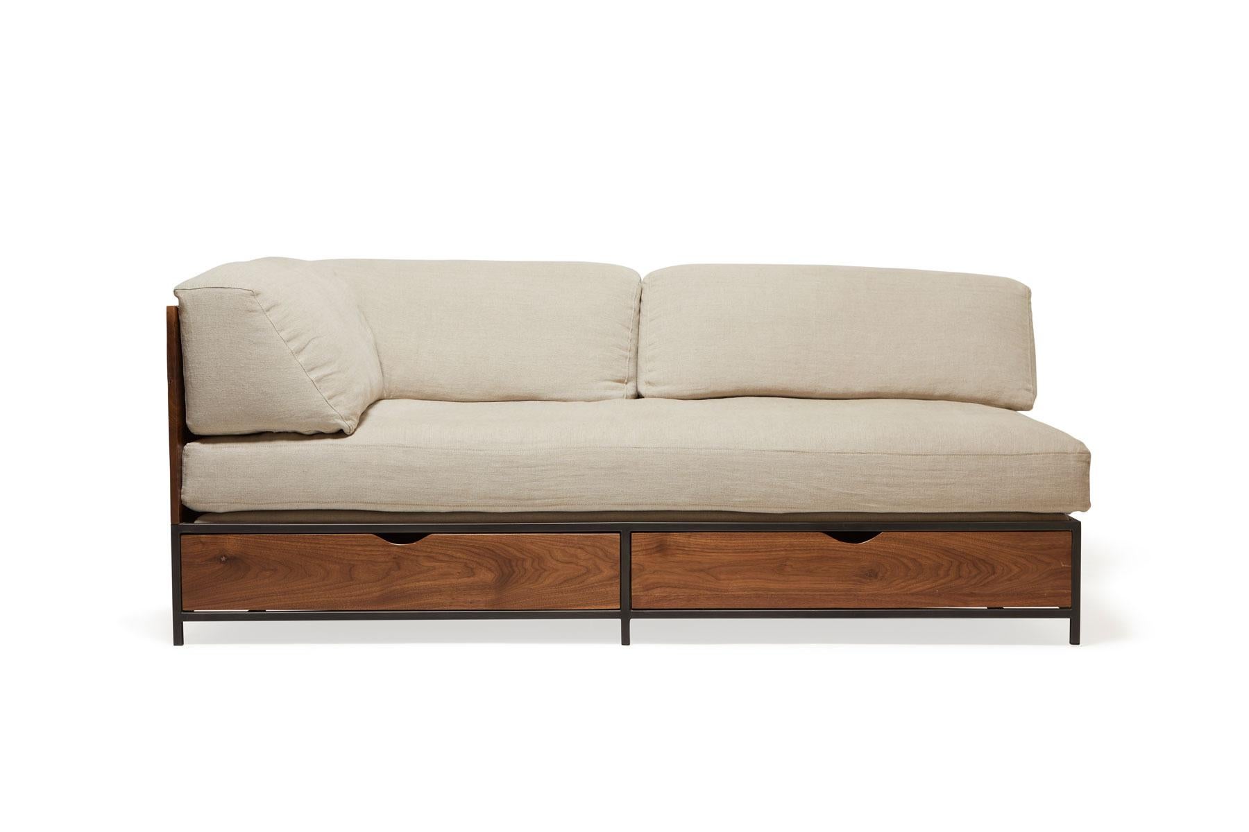 This deep and lounge sofa is comprised of two pieces that can easily be converted to two single beds, or a split king bed. When in the guest bed configuration, each bed is the size of a twin mattress and fits twin sheets. When pushed together it