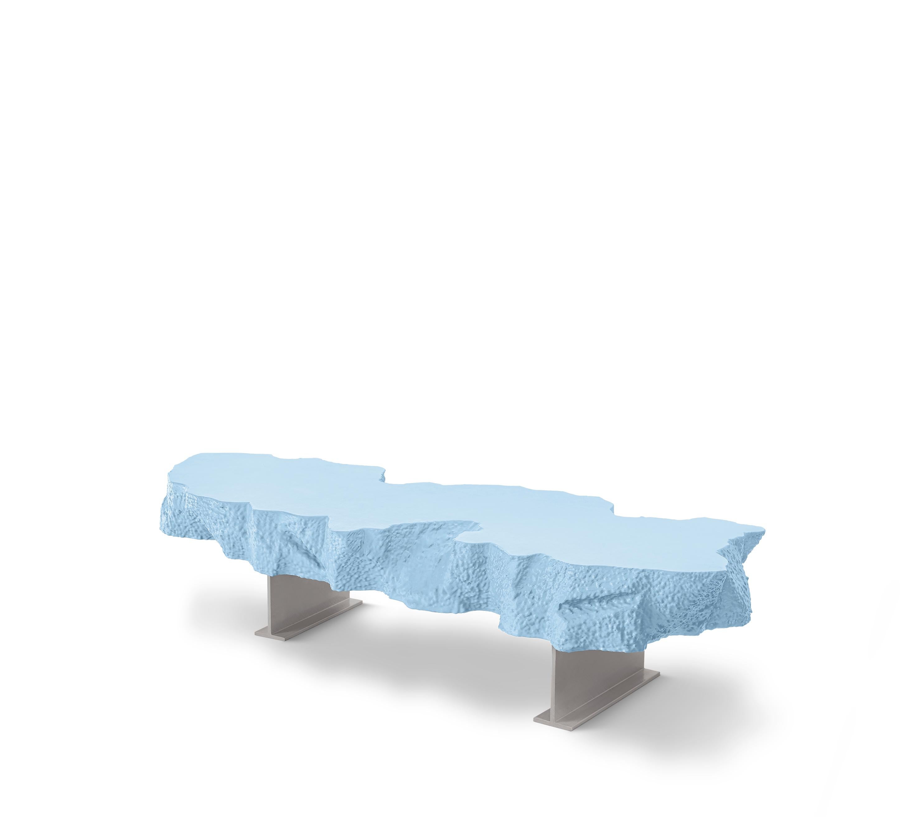 The Broken Bench, an irregular slab of “soft concrete” in polyurethane, seems to be the part missing from the large Broken Mirror, and just like the other pieces of the collection plays with the “short-circuit” between the actual softness of the