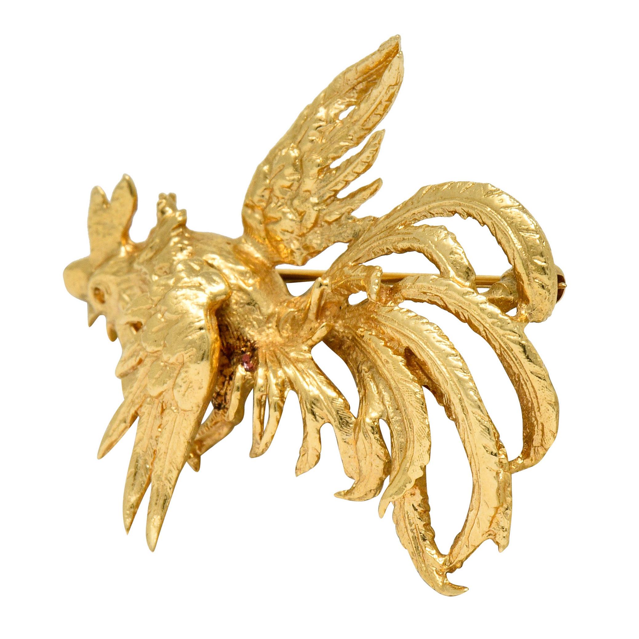 Clips are designed as two lively roosters with spread wings and fancifully plumed tail feathers

Dynamically formed with deeply engraved details

Completed by pin stems and locking closures

Signed Cini and stamped 14K for 14 karat gold