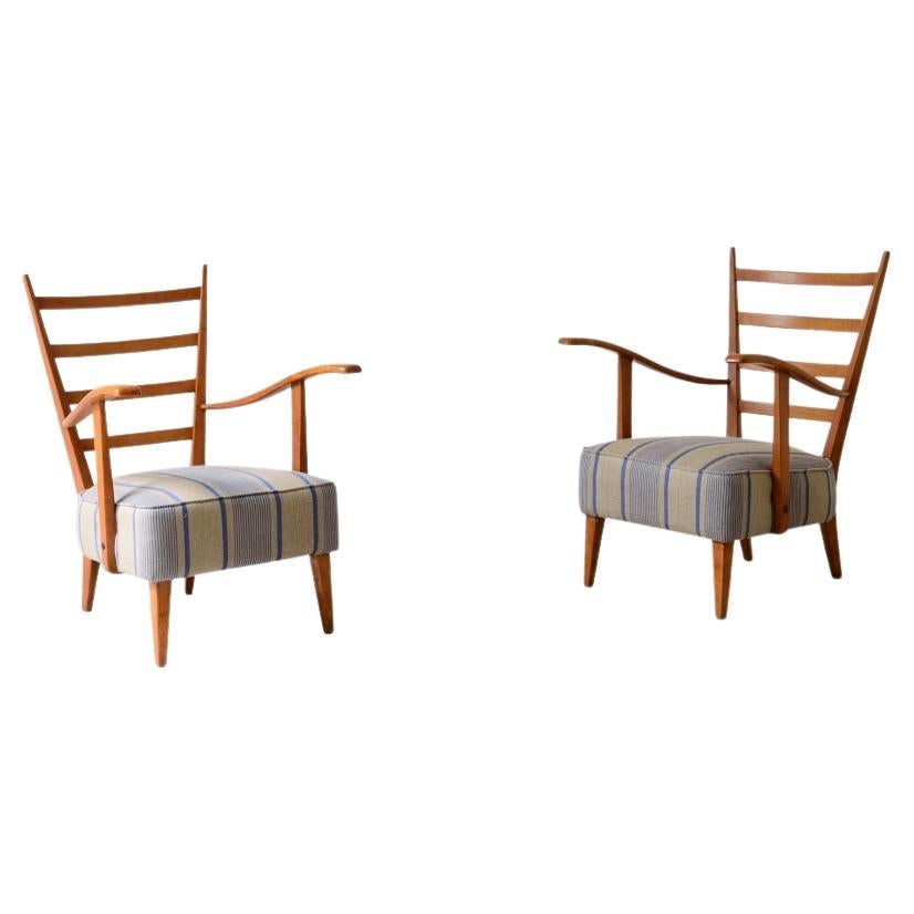 Guglielmo Pecorini's pair of shaped cherry wood armchairs For Sale