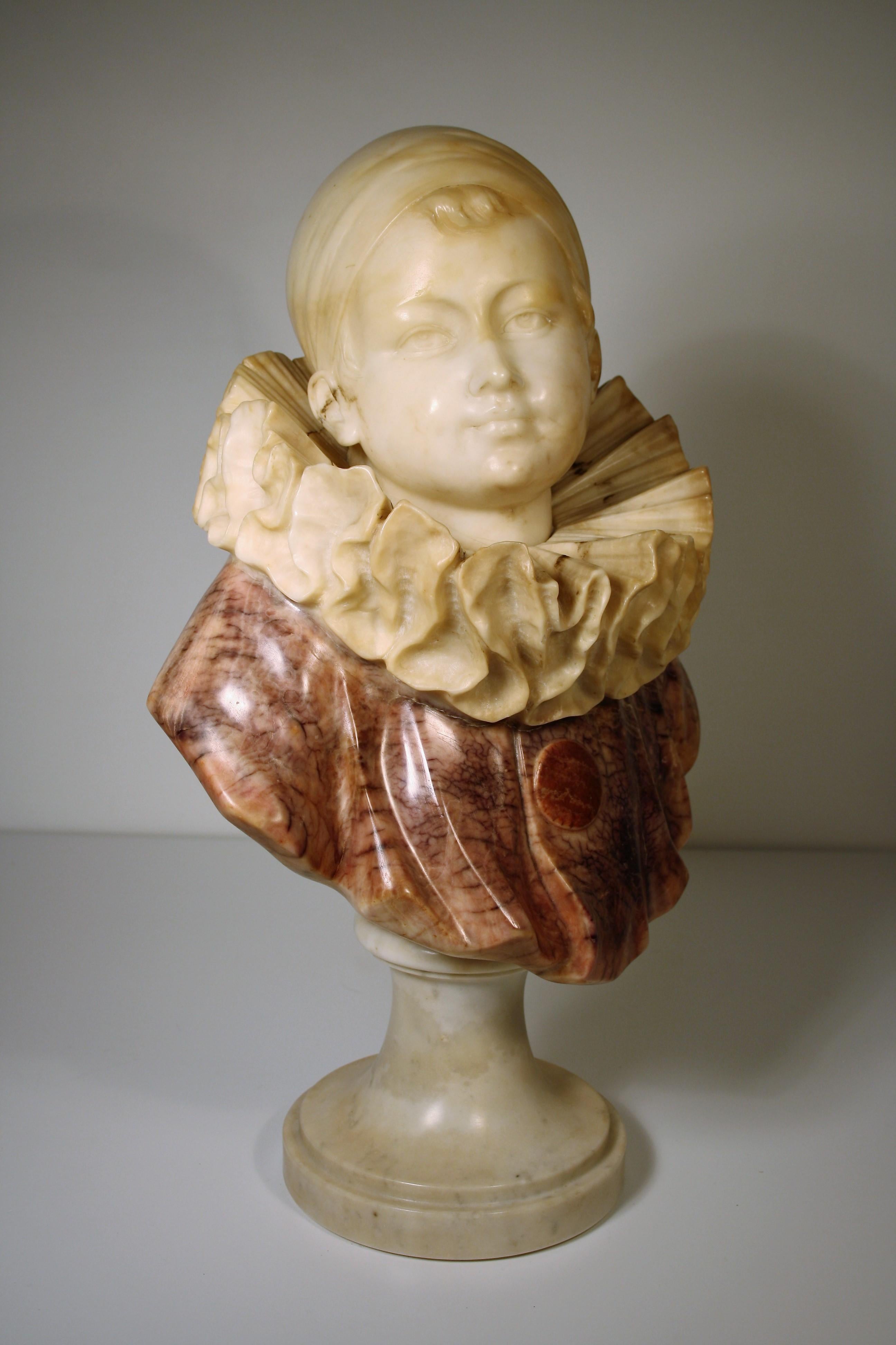 Very fine carved sculpture of a young Pierrot by Guglielmo Pugi (1850-1915), late 19th century in alabaster and white Carrara marble foot.
The sculpture is in very good condition and is signed on the back Pugi.