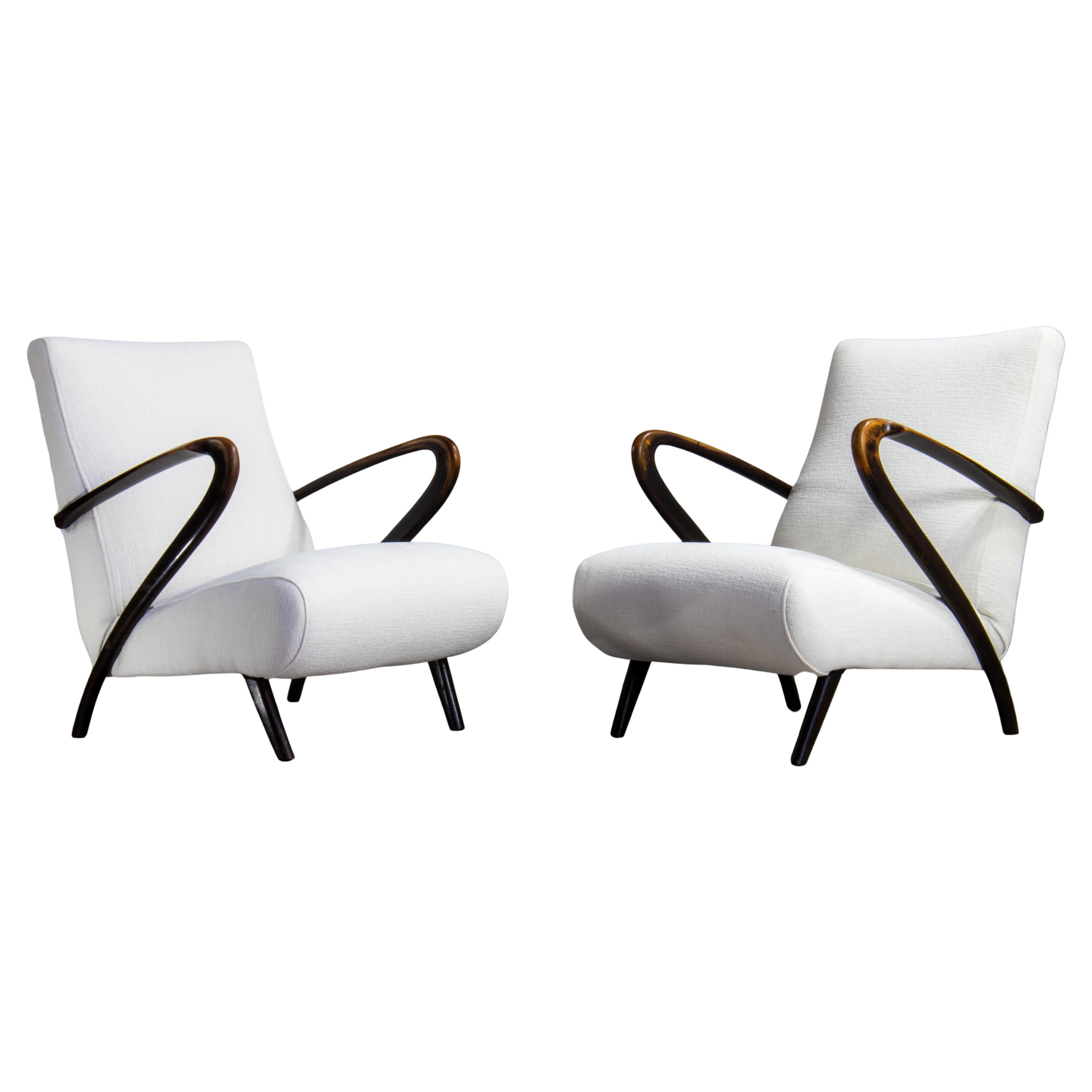 Guglielmo Ulrich Fauteuils Liberty italiens des années 1930, Paire de fauteuils en bois sculpté en vente