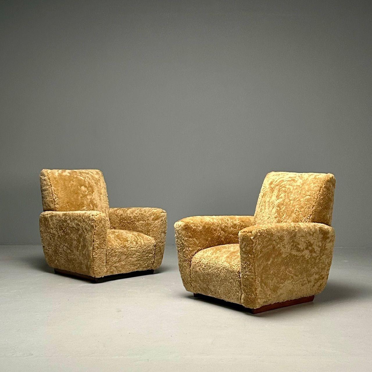 Guglielmo Ulrich Attribution, Italian Mid-Century Modern, Sheepskin Lounge Chairs, Shearling, Walnut, Italy, 1950s
 
Pair of lounge chairs attributed to Guglielmo Ulrich (1904-1977) and produced in Italy circa 1950s. These low profile club or lounge