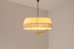 Guglielmo Ulrich brass pendant chandelier with a drum-shaped pleat