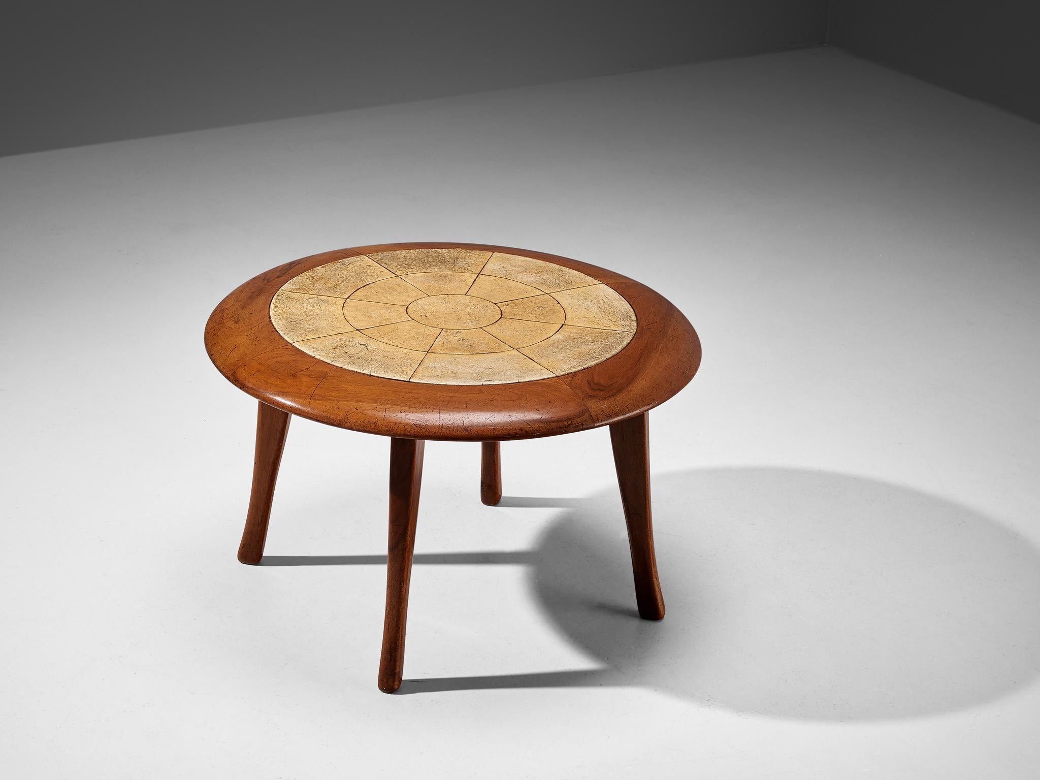 Guglielmo Ulrich, coffee table, sand-colored parchment, walnut, Italy, circa 1940

Stately and elegant coffee table designed by Italian master Guglielmo Ulrich around 1940. This table has a beautiful inlay of parchment on top of the table. The wood