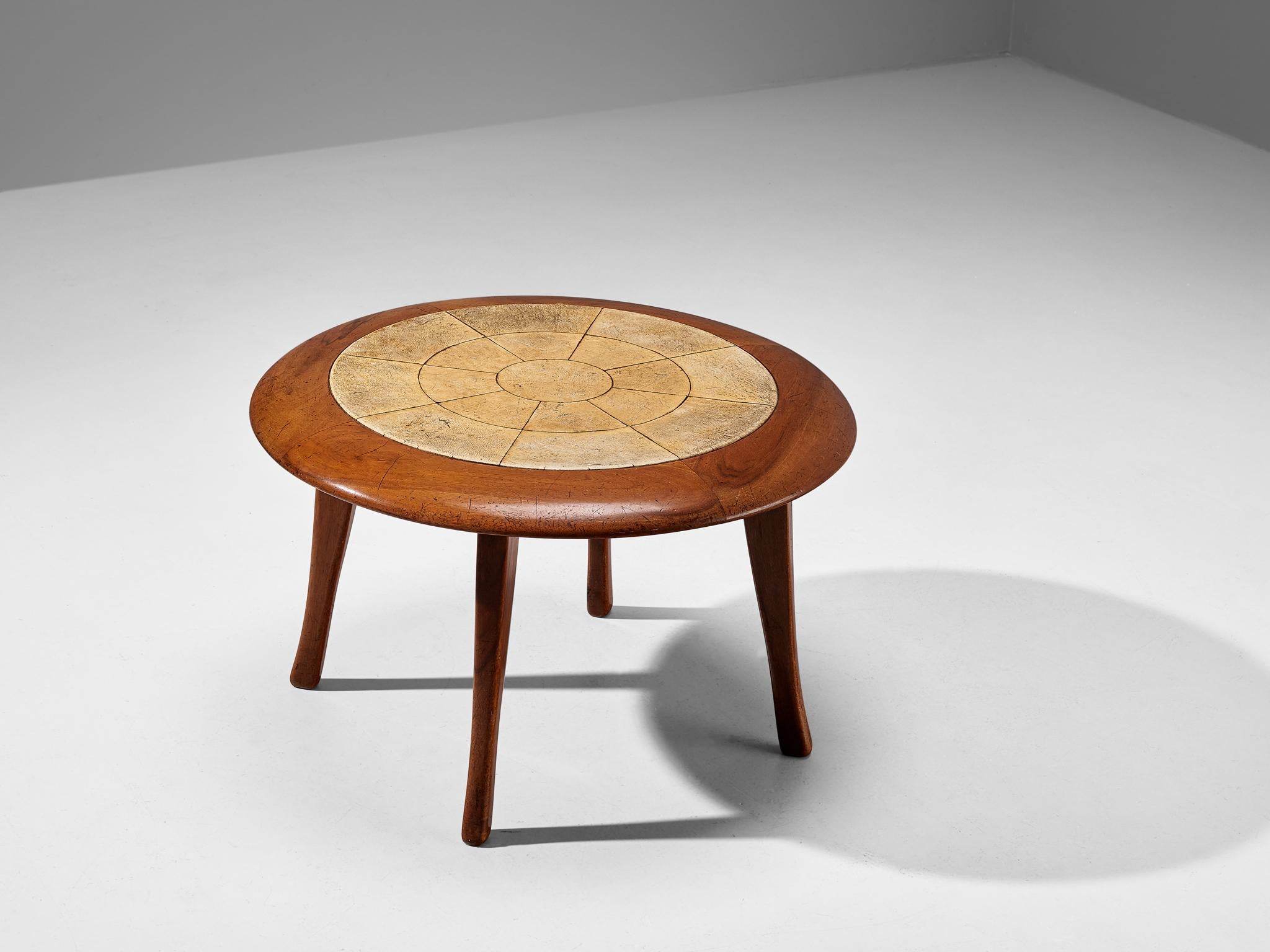 Guglielmo Ulrich, coffee table, sand-colored parchment, walnut, Italy, circa 1940

Stately and elegant coffee table designed by Italian master Guglielmo Ulrich around 1940. This table has a beautiful inlay of parchment on top of the table. The wood