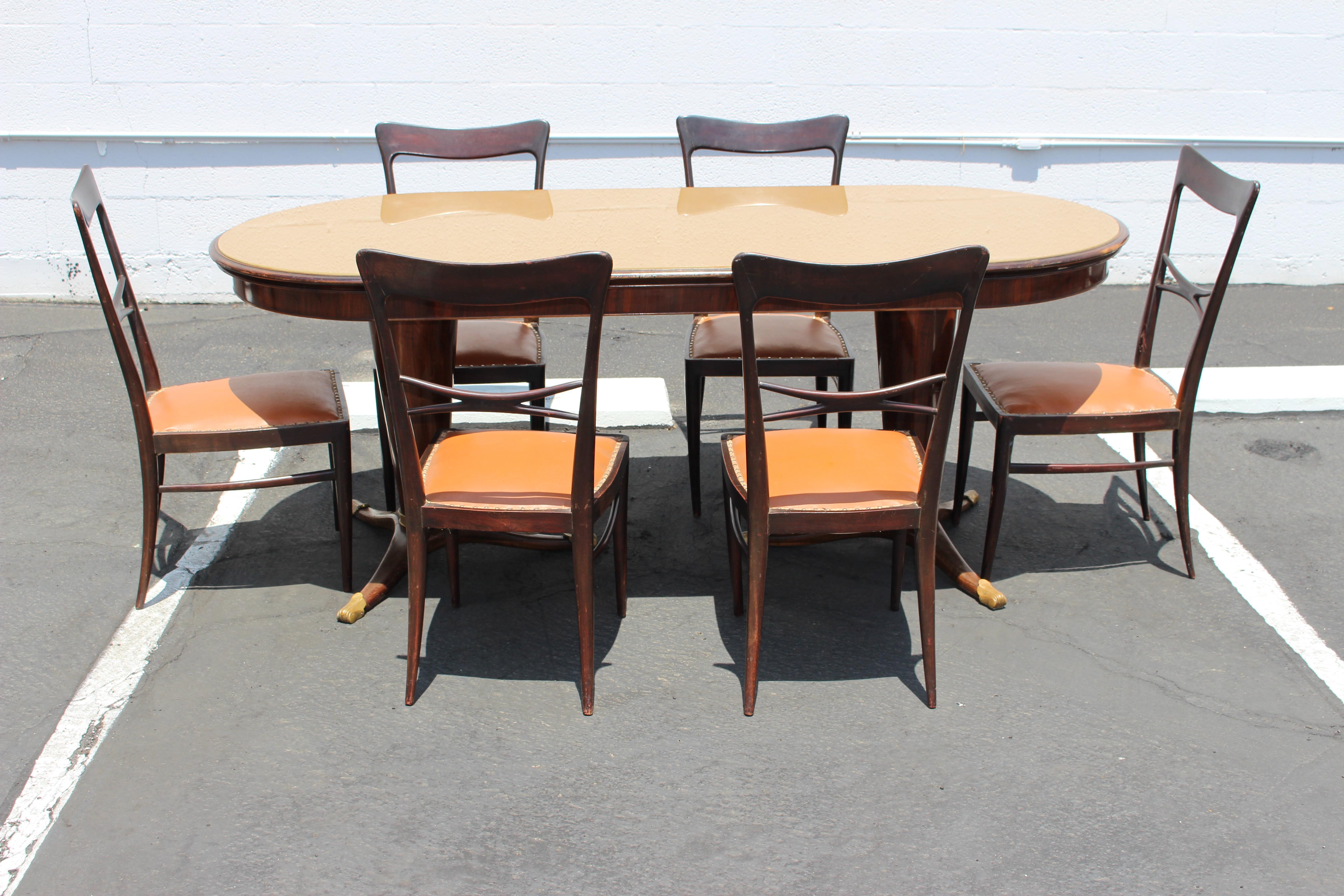 Italian 1950s Paolo Buffa style dining room set. Walnut base mirrored glass top and the brass feet, table can be dismantle for the easy transport.
