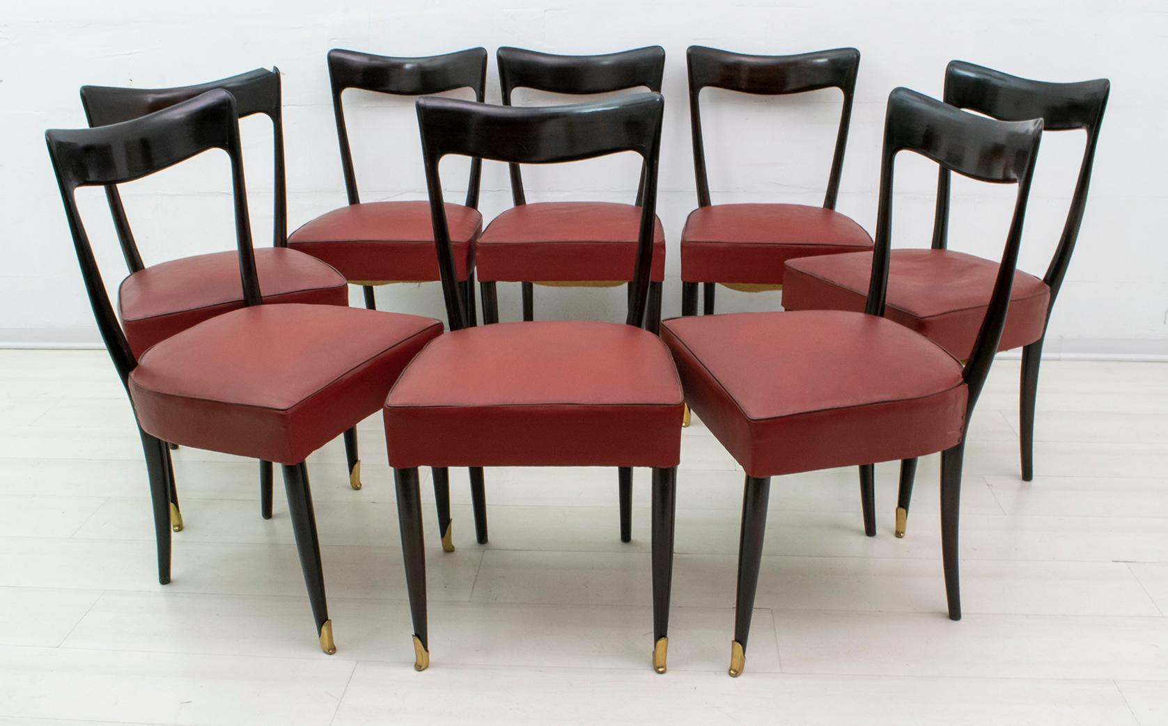 Eight chairs designed by the well-known designer Guglielmo Ulrich and produced by Arredamenti Casa between the 1940s and 1950s. The eco-leather upholstery is original of the time, in excellent condition, does not require any restoration.

In 1930